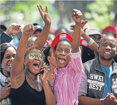  ??  ?? JOY: People danced and sang across Harare in a spectacle of free expression impossible during Mugabe’s rule