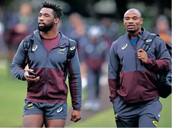  ?? |
STEVE HAAG ?? SPRINGBOKS Siya Kolisi (captain) and Makazole Mapimpi at the Bok training camp in Durban.