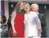  ?? CHIP SOMODEVILL­A/GETTY IMAGES ?? Hillary Clinton, along with her family, Chelsea and Bill Clinton, acknowledg­es the crowd.
