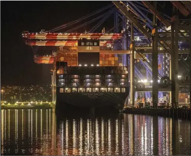  ?? (AP/Damian Dovarganes) ?? The Container ship Cam Cgm Arctic is moored at Maersk APM Terminals Pacific, Pier 400, at the Port of Los Angeles in November.