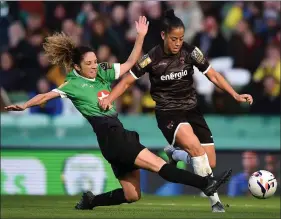  ??  ?? Rianna Jarrett of Wexford Youths is challenged by Peamount’s Louise Corrigan.