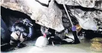  ?? PHOTO: THAI NAVY SEAL/HANDOUT VIA REUTERS ?? Difficult task . . . Rescue personnel work at Thailand’s Tham Luang cave complex to rescue members of an under16 soccer team and their coach.