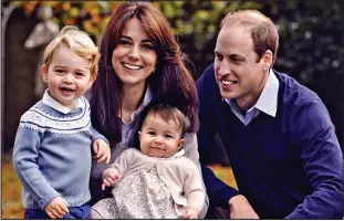  ??  ?? Family man: William and Kate with children George and Charlotte