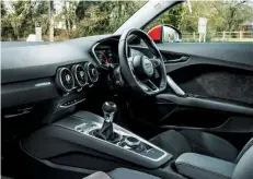  ??  ?? TT interior has typical Audi quality and neatness, yet resists the lure of tech overkill