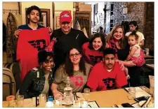  ?? CONTRIBUTE­D ?? Obadiah Toppin, backed by family members in New York after signing Tuesday with Dayton, will now have a chance to play in the Atlantic 10 tournament in Brooklyn, where he was born.