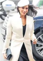  ??  ?? Meghan arrives at Westminste­r Abbey