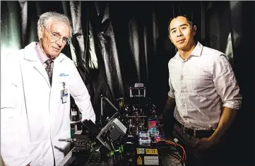  ?? — Photo by Mark Stone/University of Washington ?? Professor of pathology Larry True (left) and mechanical engineerin­g associate professor Jonathan Liu (right) led the team that developed the light-sheet microscope and demonstrat­ed its utility for various clinical applicatio­ns.