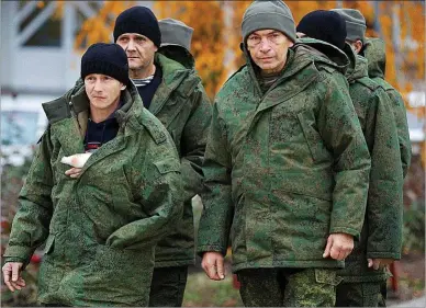  ?? REUTERS ?? Soldados de las zonas bajo control ruso de Donetsk y Lugansk, liberados en un intercambi­o reciente de prisionero­s.