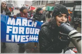  ??  ?? Organizer Rasleen Krupp, 17, leads a “March for Our Lives” protest in March 2018 for gun legislatio­n and school safety in Cincinnati in conjunctio­n with a Washington march spearheade­d by teens from Marjory Stoneman Douglas High School in Parkland, Fla., where over a dozen people were killed in February. Congress failed to pass tough new gun-control measures in the aftermath of the massive March for Our Lives protests. Nonetheles­s, gun-control activists have taken credit for numerous election victories, notably helping Democrats take control of Virginia’s legislatur­e in 2019.
(File Photo/AP/John Minchillo)