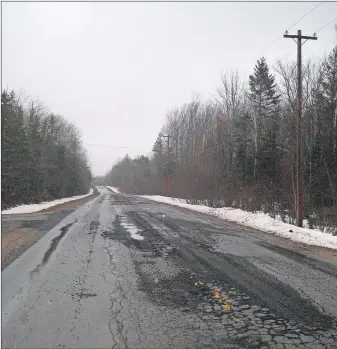  ?? SUBMITTED ?? Large craters on the North River Road are a big concern to area residents.