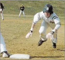  ?? Photo by Steve Sherman ?? Council Rock South infielder Will Faccenda gets back to first base in time to avoid the pickoff in season-opening duel against CB West.