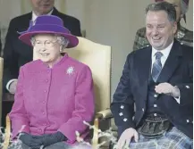  ?? ?? 0 The Queen and First Minister Jack Mcconnell at the opening of the Scottish Parliament building today in 2004