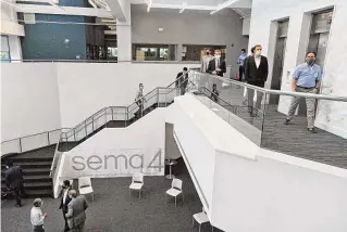  ?? Hearst Connecticu­t Media file photo ?? Elected officials take a tour of genomic testing firm Sema4’s lab at 62 Southfield Ave., Stamford, on Sept. 18, 2020. The company, now known as GeneDx, reported nearly 700 layoffs to the Connecticu­t Department of Labor in 2022.