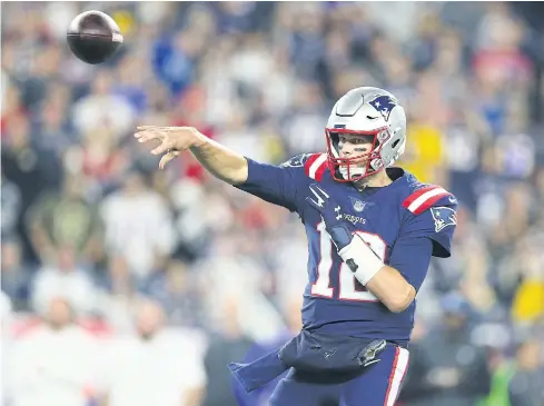  ??  ?? Patriots quarterbac­k Tom Brady throws a pass against the Colts at Gillette Stadium in Foxborough.