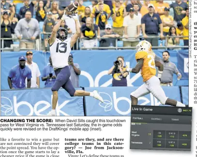  ??  ?? CHANGING THE SCORE: When David Sills caught this touchdown pass for West Virginia vs. Tennessee last Saturday, the in-game odds quickly were revised on the DraftKings’ mobile app (inset).