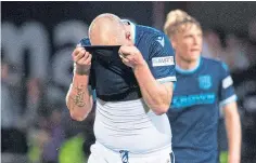  ?? ?? Dundee skipper Charlie Adam could not stop the drop.