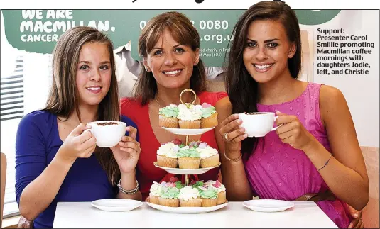  ??  ?? Support: Presenter Carol Smillie promoting Macmillan coffee mornings with daughters Jodie, left, and Christie