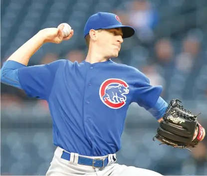  ?? | JUSTIN K. ALLER/ GETTY IMAGES ?? Kyle Hendricks, who got a no- decision, allowed two runs and five hits in 6‰ innings against the Pirates.