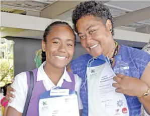  ?? Photo: Paulini Ratulailai ?? Single mum Menani Ledua with daughter Fane Ledua after the APTC graduation at Novotel in Nadi yesterday.