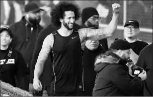  ?? CARMEN MANDATO/GETTY-AFP ?? Colin Kaepernick visits with fans following a workout Saturday in Riverdale, Ga.