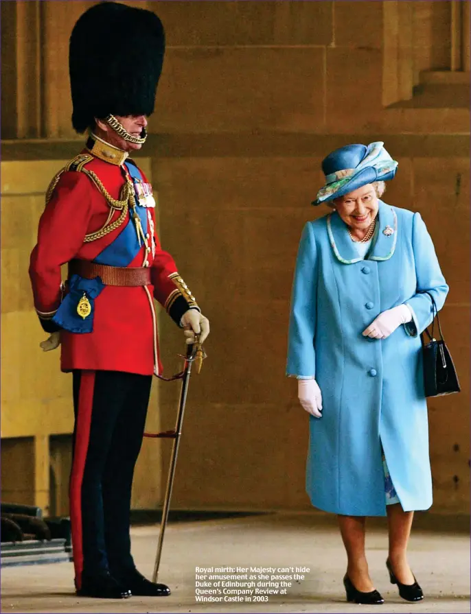  ?? ?? Royal mirth: Her Majesty can’t hide her amusement as she passes the Duke of Edinburgh during the Queen’s Company Review at Windsor Castle in 2003