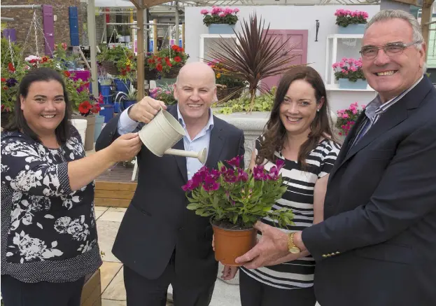  ??  ?? Elaine Walsh, Sean Gallagher, Maria Nolan, and Michael Nolan at Cois Na hAbhann garden centre in Camolin, Co Wexford. Photo: Mary Browne