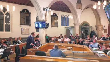  ??  ?? Cllr Simon Cook addresses the Guildhall during Tuesday night’s budget meeting.