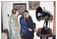  ?? Doug Walker ?? Jan Keith (left) and Britton Rogers, neighbors in historic homes in Atlanta, check out some of the antiques inside the Claremont House during a tour of historic sites in Rome Saturday. The tour was part of the APC Fall Excursion.