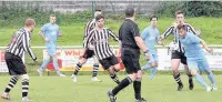  ??  ?? Llwydcoed and Llanelli players try to win possession