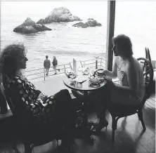  ?? Jason Grow / The Chronicle 1989 ?? Left: Sutro Baths burned down in 1966 and were not rebuilt. Above: Diners enjoy the view at the Cliff House in 1989.