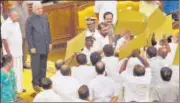  ?? PTI ?? Kerala governor Arif Mohammad Khan blocked by protesting MLAs in the assembly in Thiruvanan­thapuram on Wednesday.