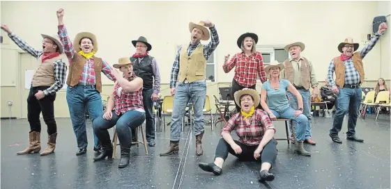  ?? PETER LEE WATERLOO REGION RECORD ?? Cast members rehearse the “Oklahoma” number for the K-W Musical Production­s 70th anniversar­y showcase, which opens on Thursday.