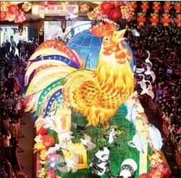  ?? XINHUA ?? The adoption of LED and new energy technologi­es made this year's lantern show in Yu Garden brighter than