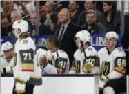  ?? JOHN LOCHER - THE ASSOCIATED PRESS ?? Vegas Golden Knights head coach Gerard Gallant, center,v looks on during the first period of a NHL hockey game against the Tampa Bay Lightning, Friday, Oct. 26, 2018, in Las Vegas.