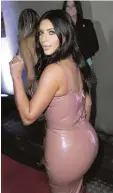  ?? Foto: dpa ?? Es gibt Frauen, die wünschen sich einen Po wie Kim Kardashian.