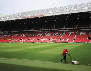  ?? ?? High value: A general view of man utd’s old Trafford stadium. The owners are in the market for a deal that values the club at about £5bil (rm26.8bil). — reuters