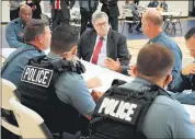  ?? THE ASSOCIATED PRESS FILE PHOTO ?? Attorney General William Barr participat­es in a roll call with police officers from the Kansas
City Police Department in Kansas City, Mo.