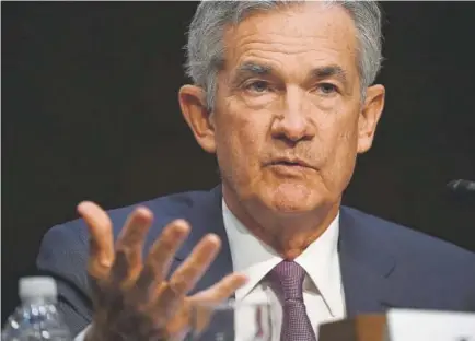  ?? Alex Wong, Getty Images ?? Federal Reserve Board Chairman Jerome Powell told the Senate Banking, Housing and Urban Affairs Committee on Tuesday that strong economic growth means the central bank will gradually raise interest rates.