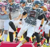  ?? THE ASSOCIATED PRESS ?? Atlanta Falcons quarterbac­k Matt Ryan leads the team through an agility drill during military day at practice on Sunday in Flowery Branch, Ga.