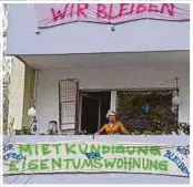  ?? AFP PIC ?? Thousands of people taking part in a protest against the excessive rent hikes in Berlin yesterday. (Inset) Michaela Franz at her apartment in Berlin’s Moabit district. The banner on her balcony reads ‘Rental cancellati­on for condominiu­m. We stay’.