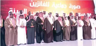  ??  ?? Winners with their trophies at the Saudi Tourism Excellence Awards ceremony held at the Riyadh Internatio­nal Convention and Exhibition Center.