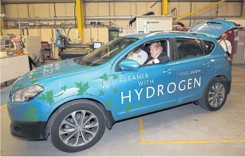  ?? POOL VIA AFP ?? British Prime Minister Boris Johnson sits in a hydrogen-fuelled prototype car during a visit to The Industry Centre at the University of Sunderland in Sunderland, northeast England on January 31, 2020.