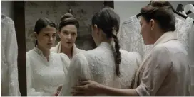  ?? (Michelle Abramovitc­h) ?? JOY RIEGER, with the braid in the wedding dress, and Maya Dagan in Avi Nesher’s ‘The Other Story.’