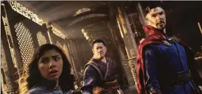  ?? Marvel Studios / Associated Press ?? From left, Xochitl Gomez as America Chavez, Benedict Wong as Wong and Benedict Cumberbatc­h as Dr. Stephen Strange in a scene from “Doctor Strange in the Multiverse of Madness.”