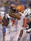  ?? AJ MAST — THE ASSOCIATED PRESS ?? Browns quarterbac­k DeShone Kizer (7) celebrates a touchdown with wide receiver Kenny Britt against the Colts on Sept. 24 in Indianapol­is.