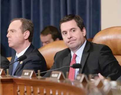  ?? | J. SCOTT APPLEWHITE/ AP ?? Congressme­n Adam Schiff and Devin Nunes attend a House Intelligen­ce Committee meeting last year.