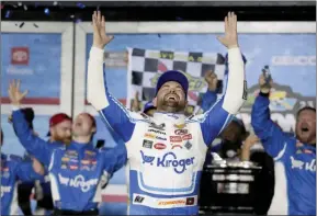  ?? The Associated Press ?? Ricky Stenhouse Jr. celebrates in Victory Lane after winning the NASCAR Daytona 500 auto race at Daytona Internatio­nal Speedway, Sunday, in Daytona Beach, Fla.
