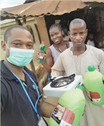  ??  ?? A scene last month of the distributi­on of clean cookstove and bio-fuel under the Access Bank Family Clean Cooking Support Programme