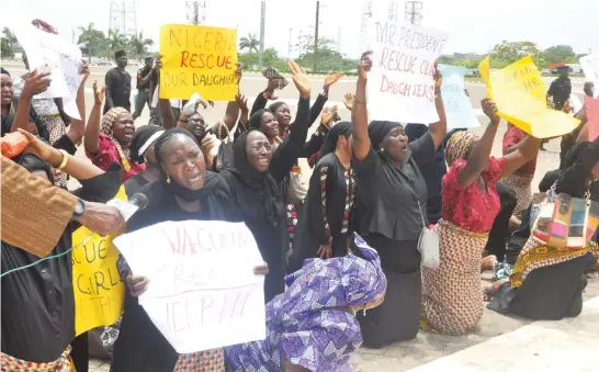  ?? PHOTO: ABUBAKAR
YAKUBU ?? Chibok women at the National Assembly in Abuja urging for action on the abducted Borno schoolgirl­s.