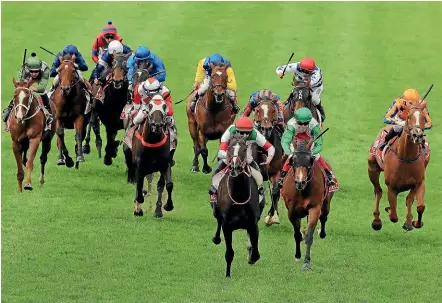  ?? GETTY IMAGES ?? Damian Lane on Lys Gracieux wins the Cox Plate during Cox Plate Day at Moonee Valley racecourse in Melbourne on Saturday.